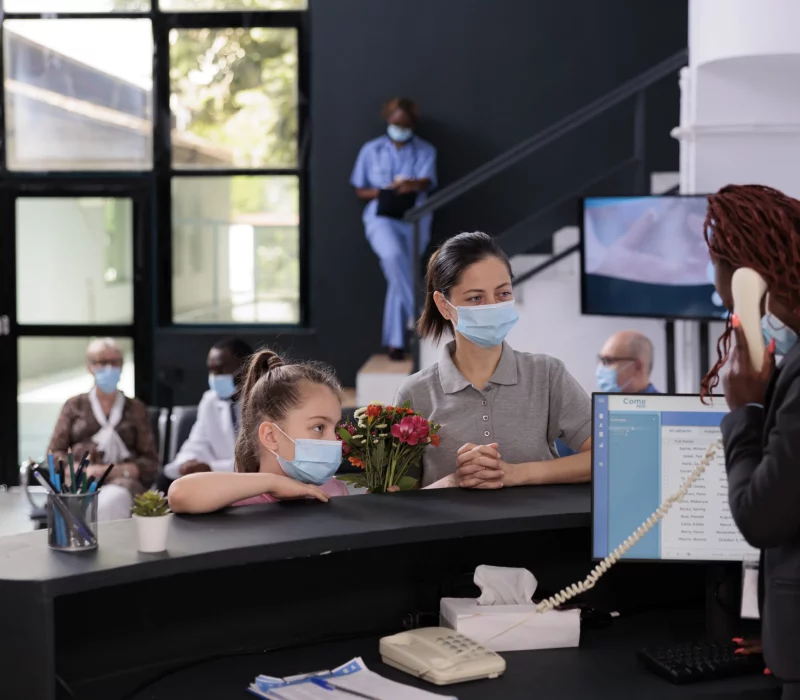 mother-and-daughter-wearing-protective-face-masks-2023-11-27-05-09-00-utc
